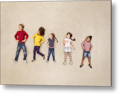 Toddler Metal Print featuring the photograph Children standing with hands on hips by Westend61