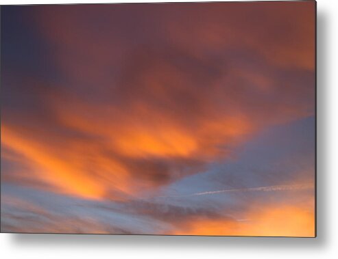 Orange Metal Print featuring the photograph Clash of the colorful clouds by Teri Schuster