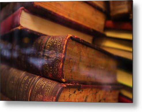 Education Metal Print featuring the photograph Close Up Of Antique Books In Leather by Tetra Images