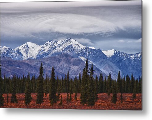 Alaskan Mountains Metal Print featuring the photograph Clouds over mountains by Jeff Folger