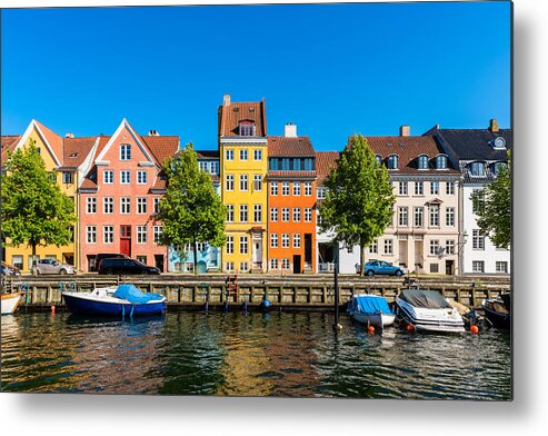 Copenhagen Metal Print featuring the photograph Colourful houses along canal in Copenhagen Denmark by © Allard Schager