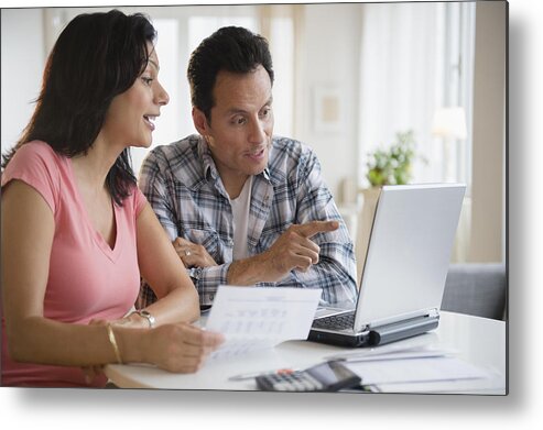 Debt Metal Print featuring the photograph Couple paying bills online by JGI/Jamie Grill