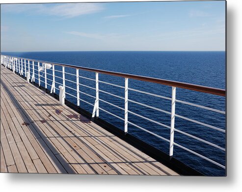 Passenger Ship Metal Print featuring the photograph Deck of a Cruise Ship by Hutchyb