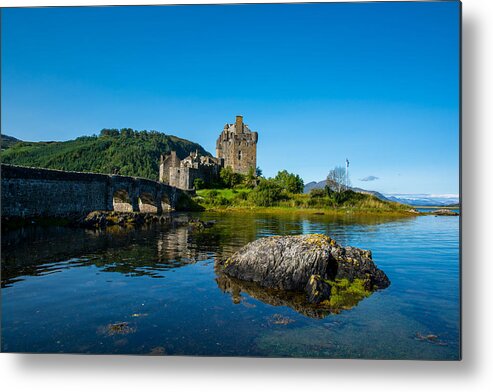Scotland Metal Print featuring the photograph Eilean Donan Castle In Scotland by Andreas Berthold