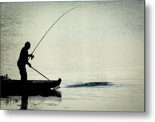 Fisher Metal Print featuring the photograph Fisherman Catching Fish On A Twilight Lake by Andreas Berthold