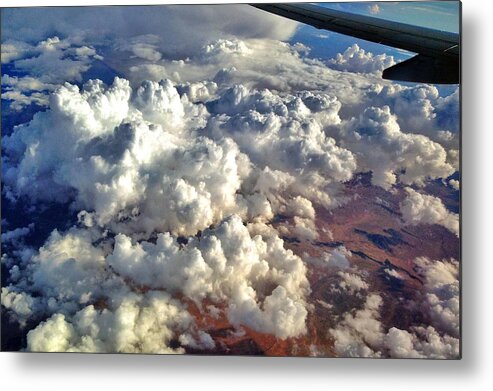 Clouds Metal Print featuring the photograph Flight by Antonio Marquis 