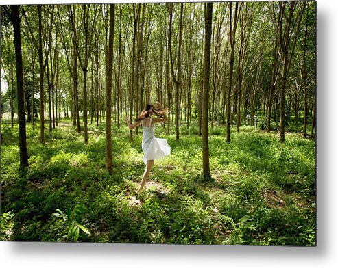 Tranquility Metal Print featuring the photograph Girl Dancing In The Woods by Stuart Corlett / Design Pics