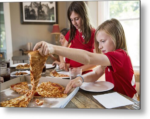 Soccer Uniform Metal Print featuring the photograph Girls soccer team eating pizza by The Good Brigade