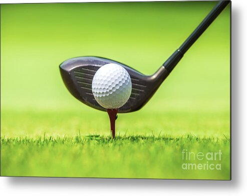 Golfing Metal Print featuring the photograph Golf ball behind driver at driving range by Anek Suwannaphoom