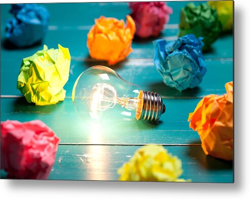 Orange Color Metal Print featuring the photograph Incandescent bulb and colorful notes on turquoise wooden table by Xxmmxx