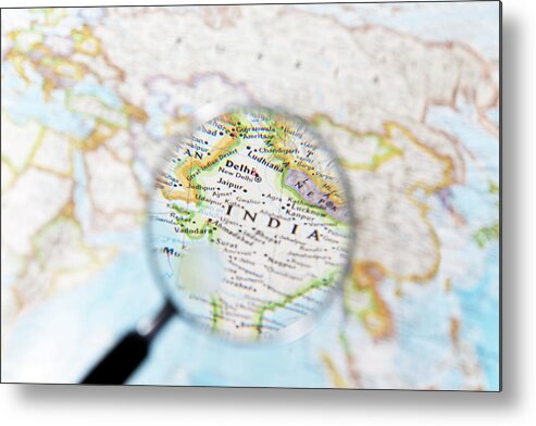 Magnifying Glass Metal Print featuring the photograph India And Magnifying Glass by Yuji Sakai