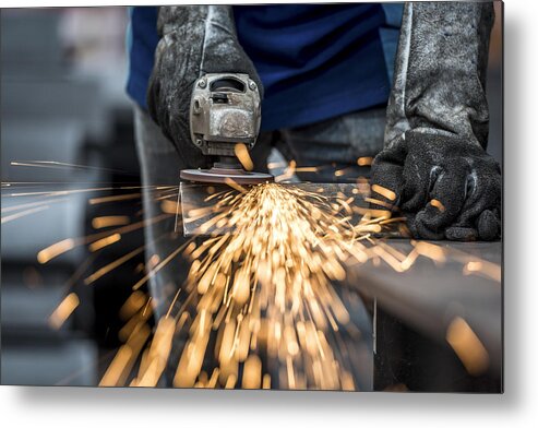 Working Metal Print featuring the photograph Industrial worker cutting metal by Std