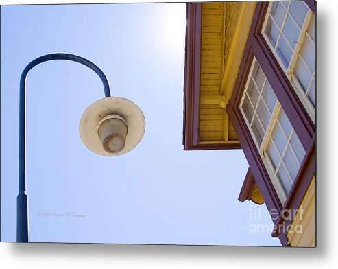 Lamppost Metal Print featuring the photograph Lamppost And Building by Richard J Thompson 