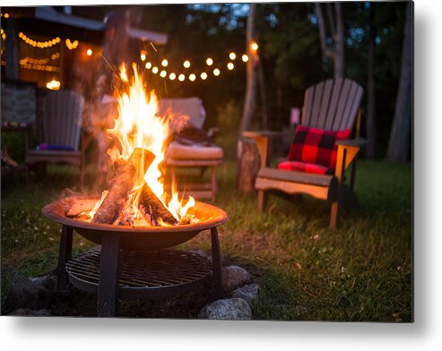 Camping Metal Print featuring the photograph Late evening campfire at a beatiful canadian chalet by Warchi