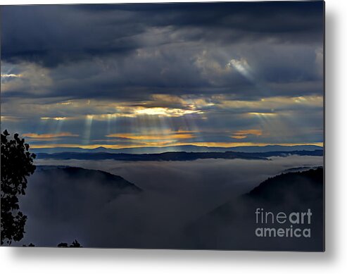 Clouds Metal Print featuring the photograph Light streaming through clouds on foggy morning by Dan Friend