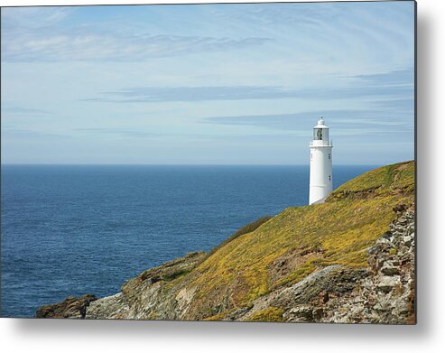 Tranquility Metal Print featuring the photograph Lighthouse On Cornish Atlantic by Dougal Waters