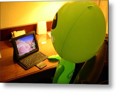 Alien Metal Print featuring the photograph Little Green Guy Reviewing Photos by Richard Henne