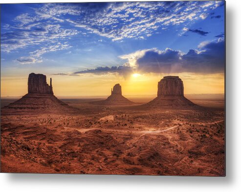 Mesa Metal Print featuring the photograph Magnificent landscape view of Monument Valley at sunset by FernandoAH