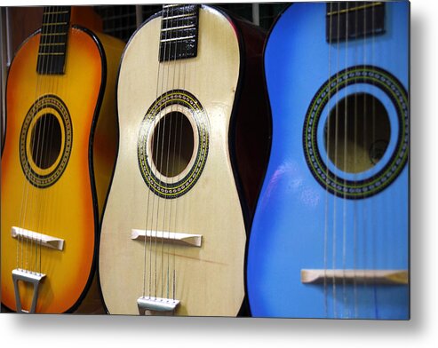 Mexican Toy Guitars Metal Print featuring the photograph Mexican Toy Guitars by Mark Langford