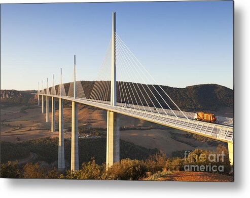 Bridge Metal Print featuring the photograph Millau Viaduct at Sunrise Midi Pyrenees France by Colin and Linda McKie