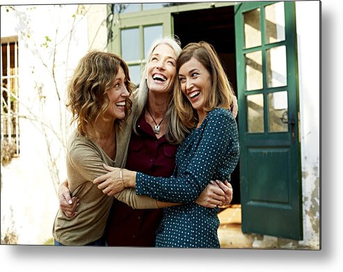 Adult Offspring Metal Print featuring the photograph Mother and daughters embracing outdoors by Morsa Images