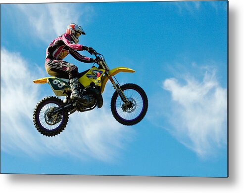 Motocross Metal Print featuring the photograph Motocross rider jumping high - blue sky by Matthias Hauser