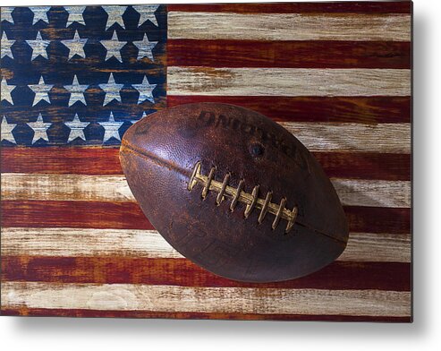Football Metal Print featuring the photograph Old Football On American Flag by Garry Gay