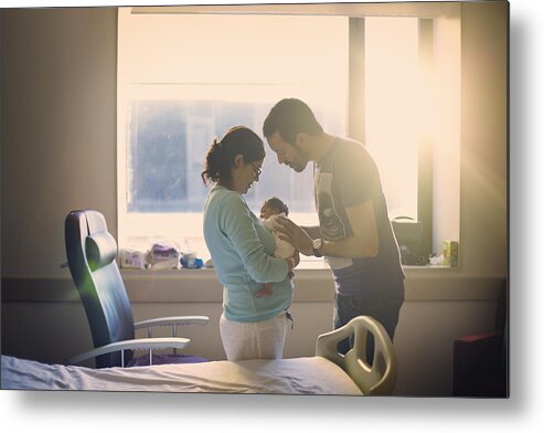 Mid Adult Women Metal Print featuring the photograph Parents with newborn at hospital by Image taken by Mayte Torres