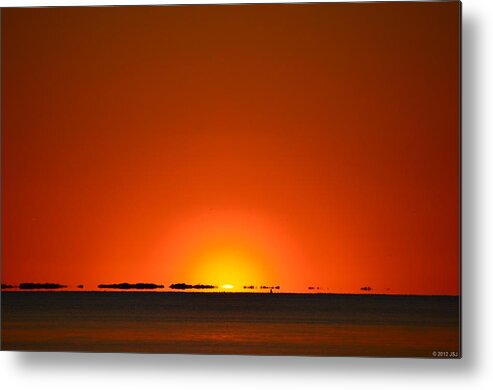 Navarre Metal Print featuring the photograph Red Sunset with Superior Mirage on Santa Rosa Sound by Jeff at JSJ Photography
