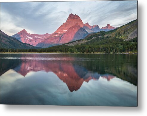 Swiftcurrent Lake Metal Print featuring the photograph Reflections on Swiftcurrent Dawn by Greg Nyquist