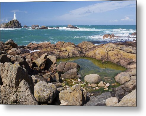 Flpa Metal Print featuring the photograph Rocky Shore And La Corbiere Lighthouse by Bill Coster