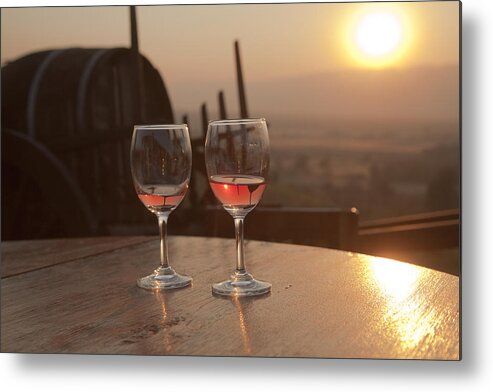 Afterglow Metal Print featuring the photograph Romantic sunset with a glass of wine by Maria Heyens