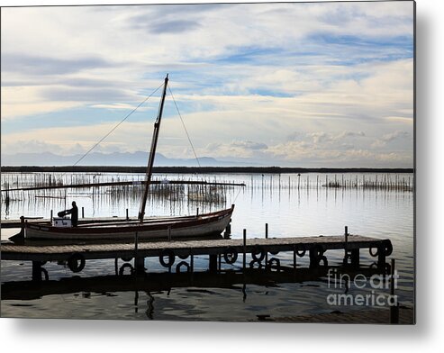 Comunidad Valenciana Metal Print featuring the photograph Sailing boat being prepared on the jetty on Lake Albufera Spain by Peter Noyce