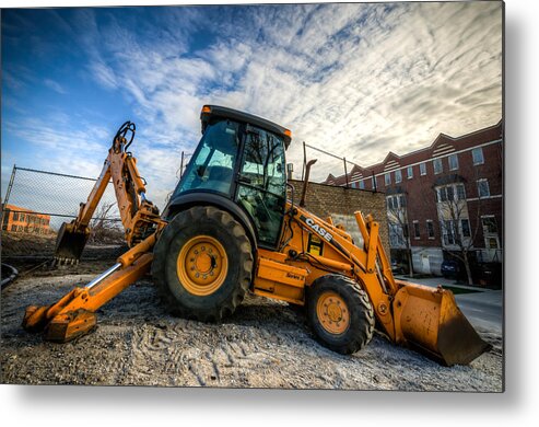 Chicago Metal Print featuring the photograph Side View of a Backhoe at Sunset by Anthony Doudt