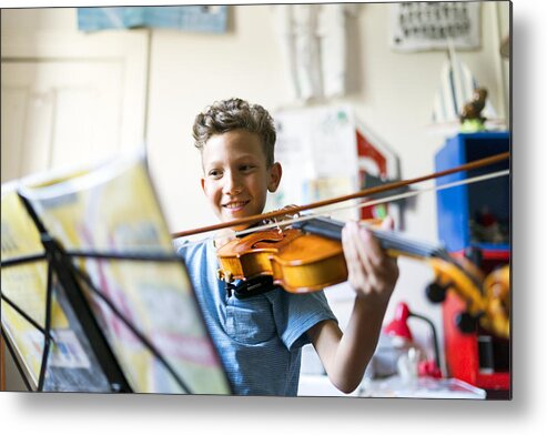 People Metal Print featuring the photograph Smiling boy playing violin in domestic room by Portra