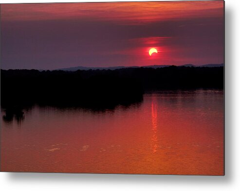 Solar Eclipse Metal Print featuring the photograph Solar Eclipse Sunset by Jason Politte