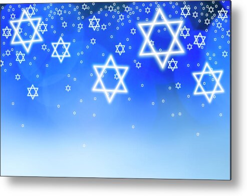 Holiday Metal Print featuring the photograph Stars Of David Against Blue Background by Tetra Images