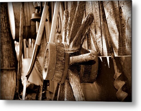 Wagon Wheel Metal Print featuring the photograph Still Here by Andrea Platt