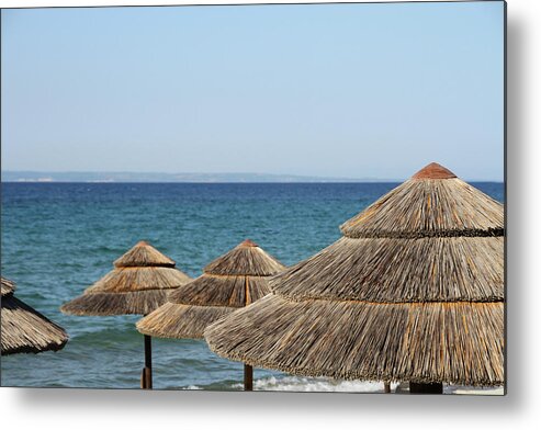 Straw Hat Metal Print featuring the photograph Straw Parasols by Suzyco