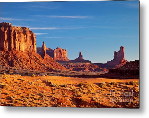 Monument Valley Metal Print featuring the photograph Sunrise over Monument Valley by Brian Jannsen