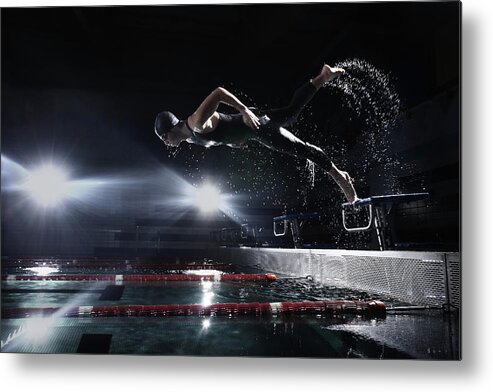 People Metal Print featuring the photograph Swimmer Jumping From Starting Platform by Stanislaw Pytel
