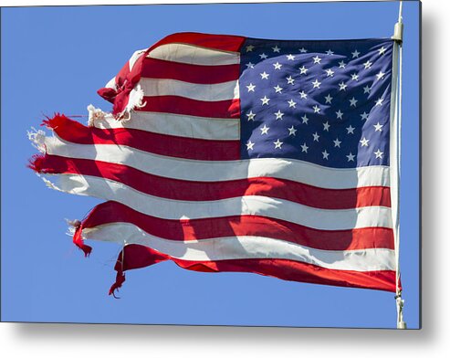 Wind Metal Print featuring the photograph Tattered American Flag, Still Flying Free and Proud by JamesBrey