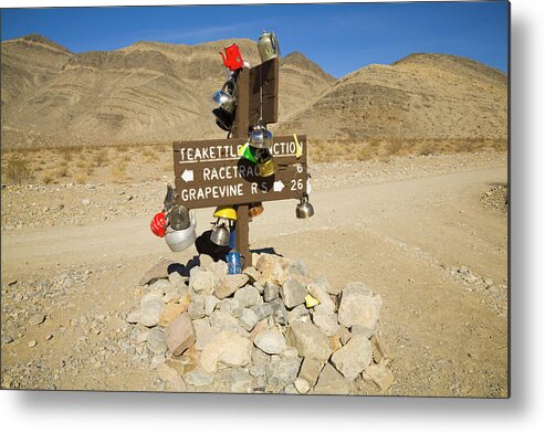 00431203 Metal Print featuring the photograph Teakettle Junction in Death Valley by Yva Momatiuk and John Eastcott