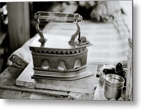 Antique Metal Print featuring the photograph The Antique Iron by Shaun Higson