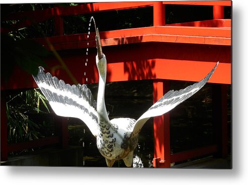 A Water Fountain In The Form Of A Japanese Crane Metal Print featuring the photograph The Crane Fountain by Tim Ernst