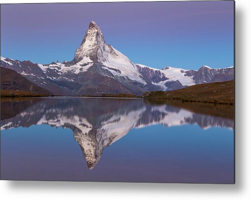 Zermatt Metal Print featuring the photograph The Famous Matterhorn Is Reflected by Menno Boermans