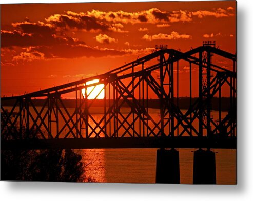 Mississippi River Metal Print featuring the photograph The Mississippi River Bridge at Natchez at sunset. by Jim Albritton
