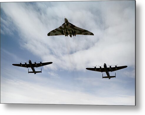 Avro Lancasters Metal Print featuring the photograph Three Avro bombers by Gary Eason