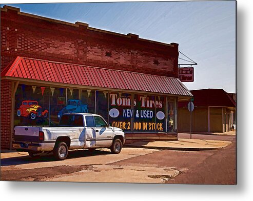 Tom's Tires Metal Print featuring the photograph Tom's Tires by Angie Rayfield