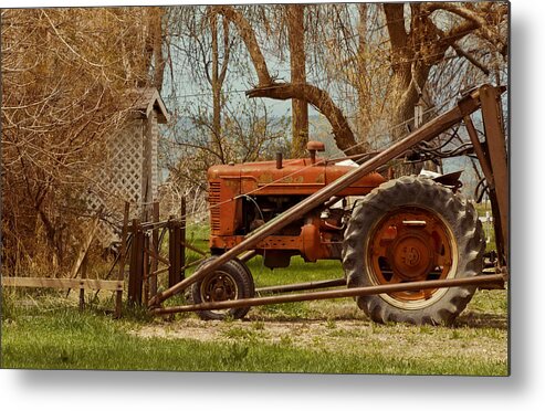 Tractor Metal Print featuring the photograph Tractor on US 285 by Bryant Coffey